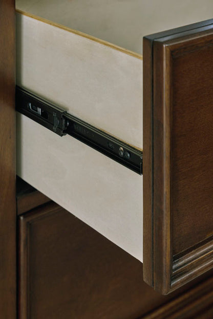Fortman Brownish Cherry Chest of Drawers