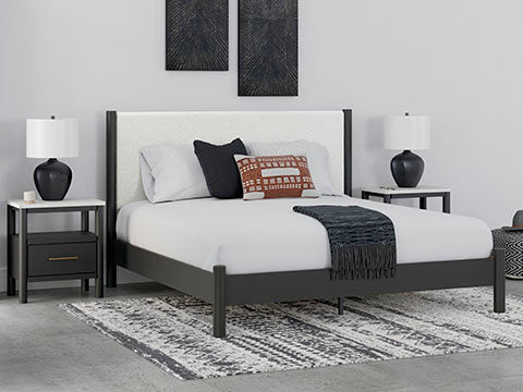 Cadmori Black King Upholstered Panel Bed