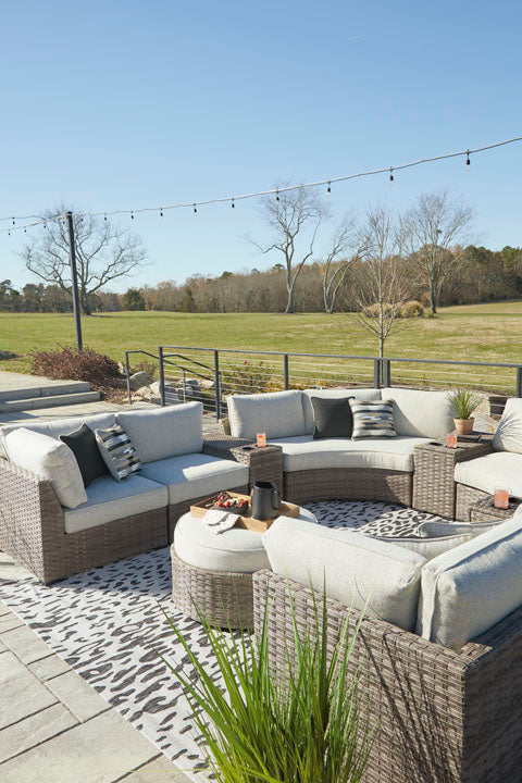 Calworth 7-Piece Outdoor Sectional with Ottoman