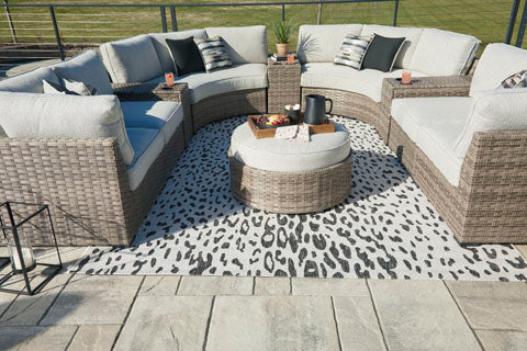 Calworth 7-Piece Outdoor Sectional with Ottoman