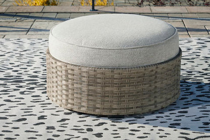 Calworth 7-Piece Outdoor Sectional with Ottoman