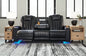 Center Point Black Reclining Sofa with Drop Down Table