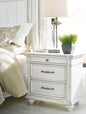 Kanwyn Whitewash Three Drawer Night Stand
