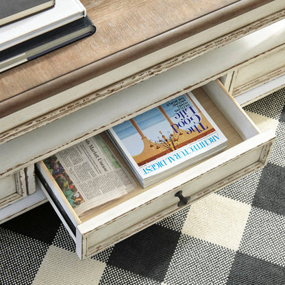 Realyn White & Brown Coffee Table with Lift Top